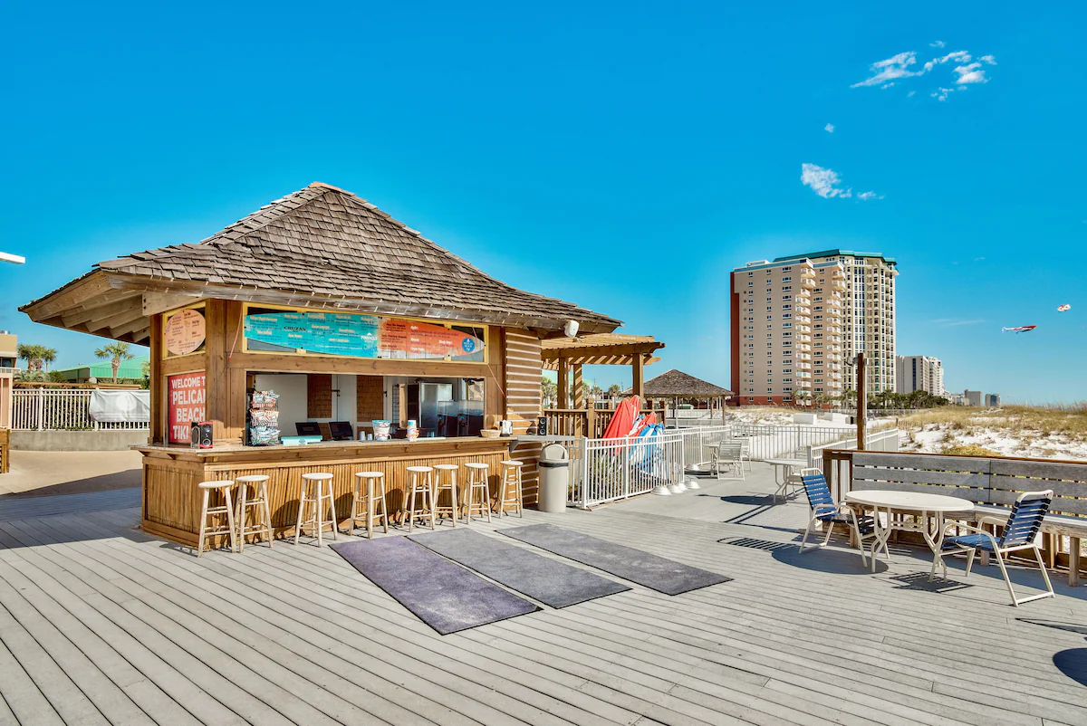 Seasonal beachfront Tiki Bar at Pelican Beach Resort in Destin